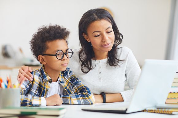 Mother and child on computer